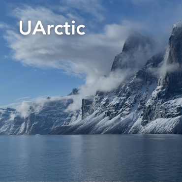 Picture of a mountain on the ocean with "U Arctic" written on top